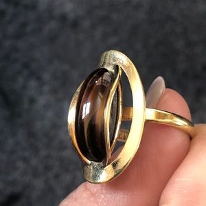SARA COV golden ring brown oval stone